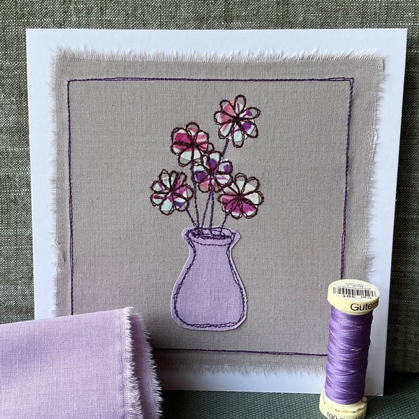 Embroidered appliqué greetings card with envelope.