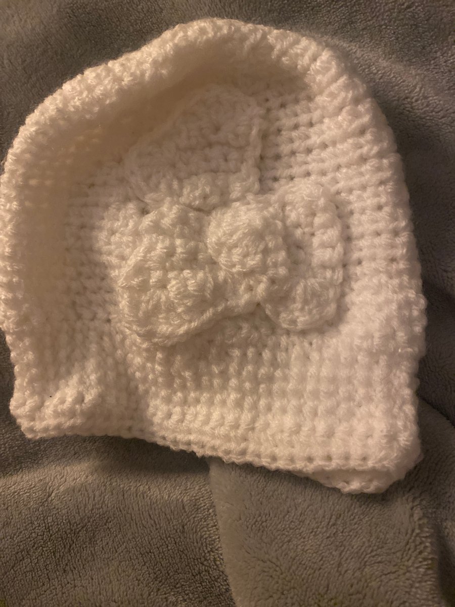Creamy white baby hat