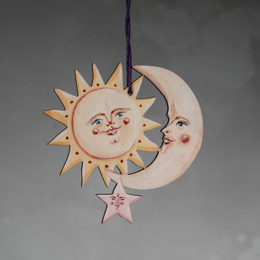 Wooden hanging decoration of a sun, moon and star- celestial art