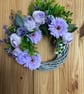 Small lilac wicker door wreath