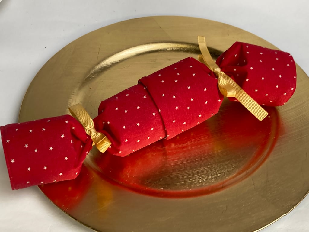 Pick and mix, reusable Christmas Crackers.  Linen-look red with cream stars.