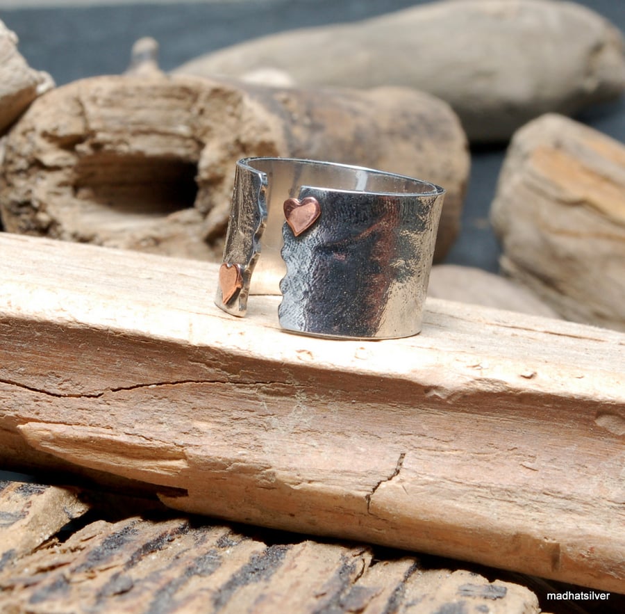 Sterling silver adjustable textured ring with copper heart detail