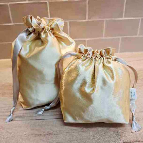 Set of 2 gold satin fabric drawstring bags