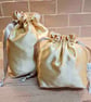 Set of 2 gold satin fabric drawstring bags