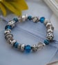 Silver and blue bead stretch bracelet - Image 2