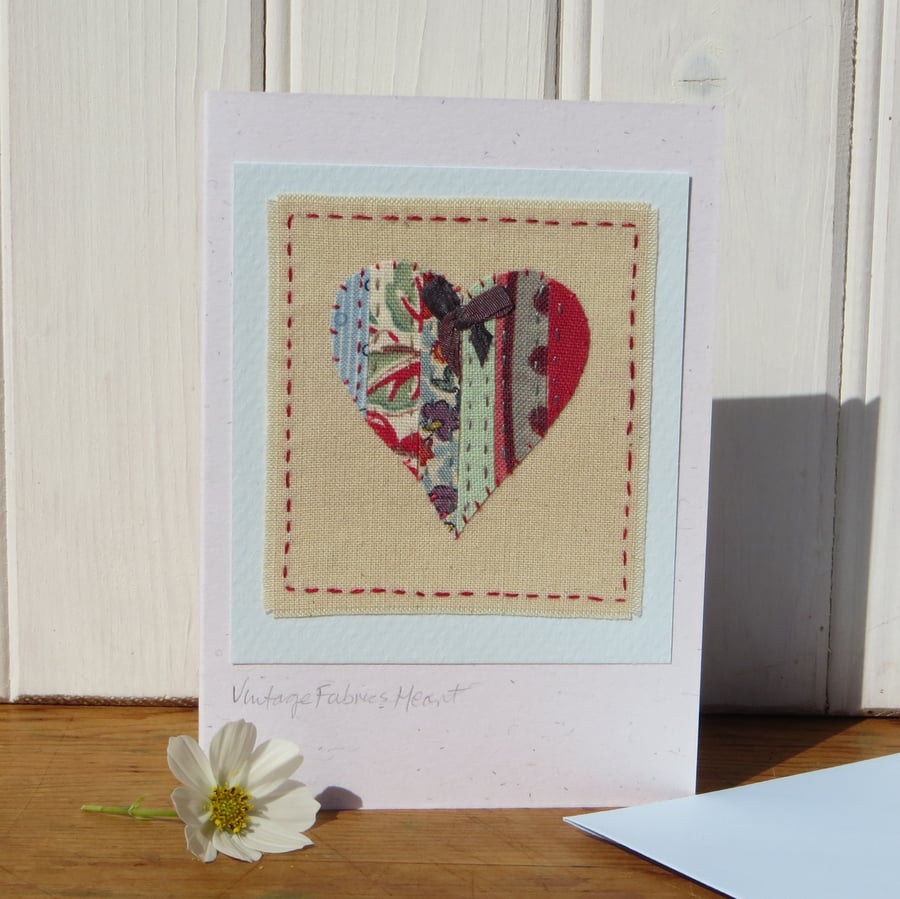 Hand-stitched card, vintage fabrics patchwork with hand-tied silk ribbon bow