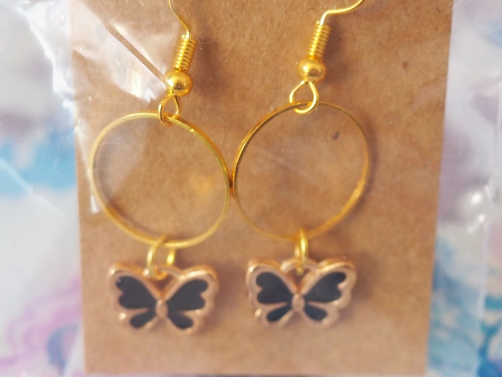 Gold Earrings with Dark Blue Butterfly Charms and Small Circles 