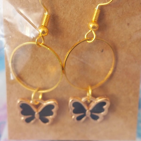 Gold Earrings with Dark Blue Butterfly Charms and Small Circles 
