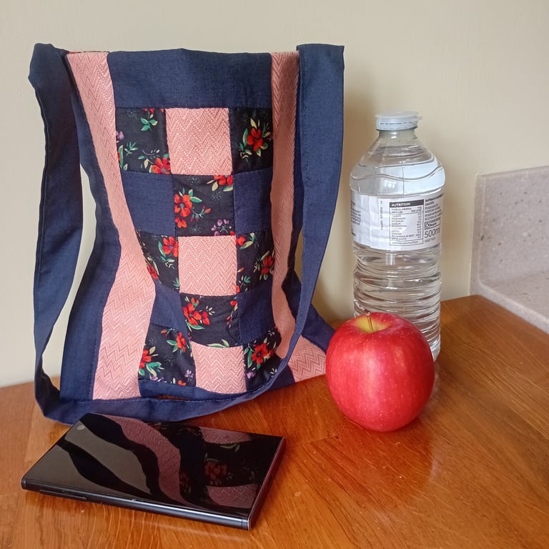 Patchwork bag. Navy blue and peach. Internal pocket.