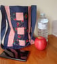 Patchwork bag. Navy blue and orange. Internal pocket.