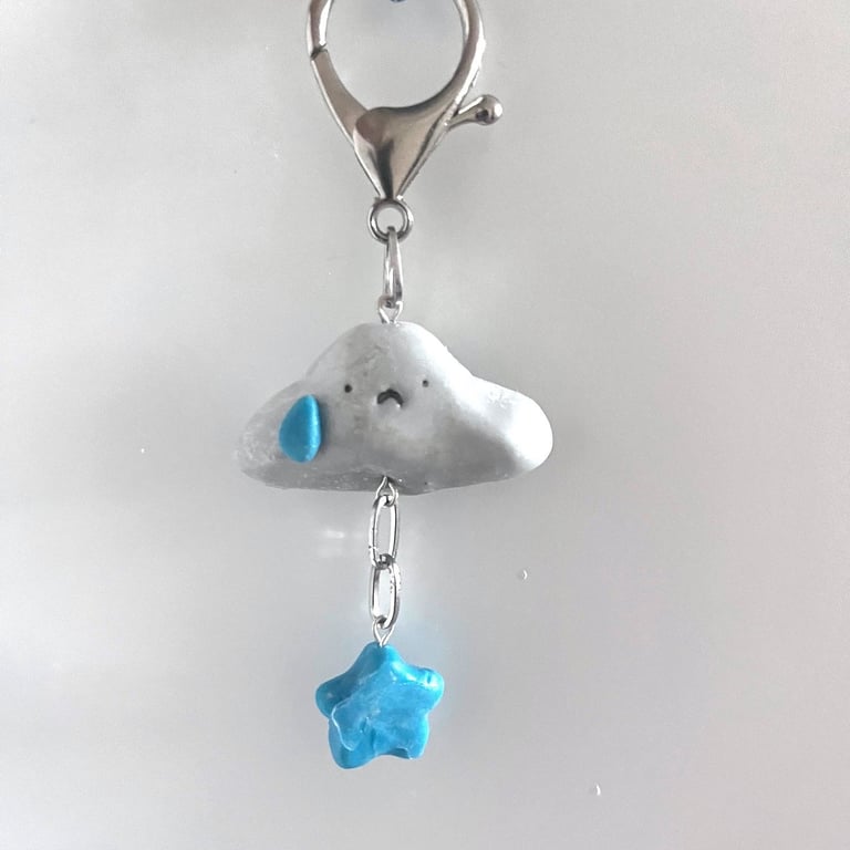 cartoon theme grey cloud keyring, hanging star underneath, perfect for gifts.