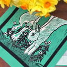"Leap for Joy" tea towel - rabbit screen print in teal and black inks