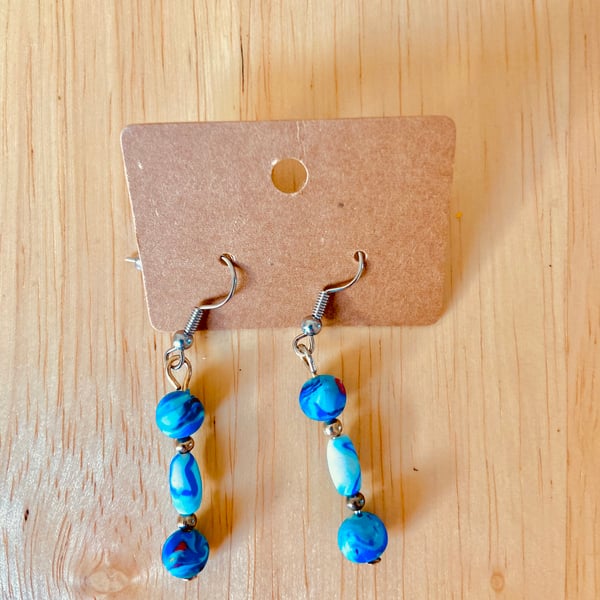 Hand made earrings made from hand made beads.