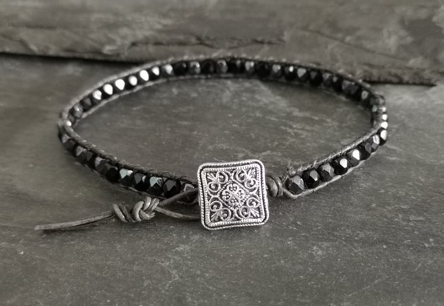 Charcoal grey leather bracelet with black and gunmetal grey glass beads