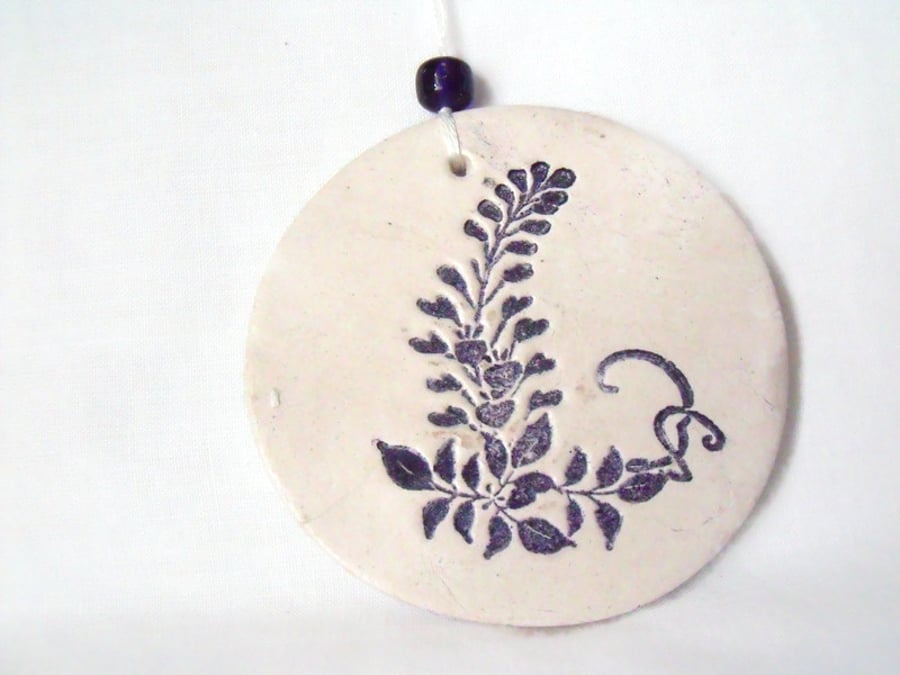 ceramic floral hanging decoration in black and white