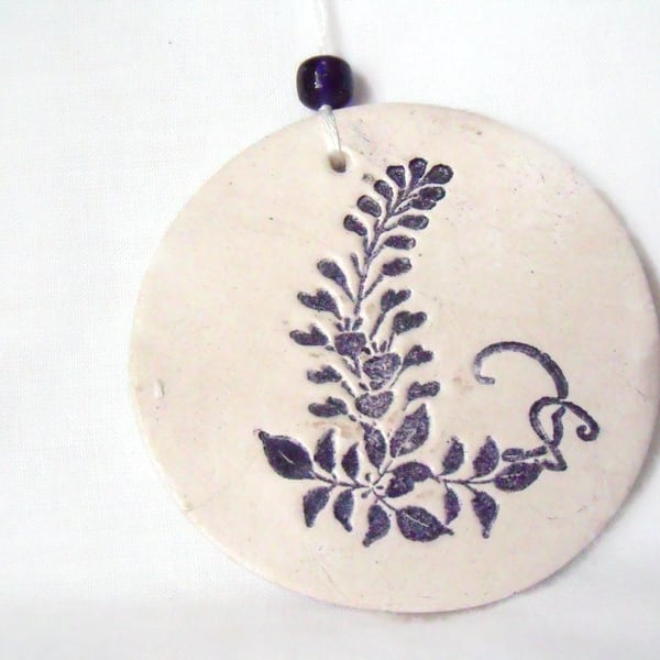 ceramic floral hanging decoration in black and white