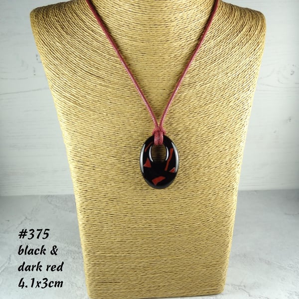 Fused glass pendant on a waxed cotton cord, off-set oval, 3 colours
