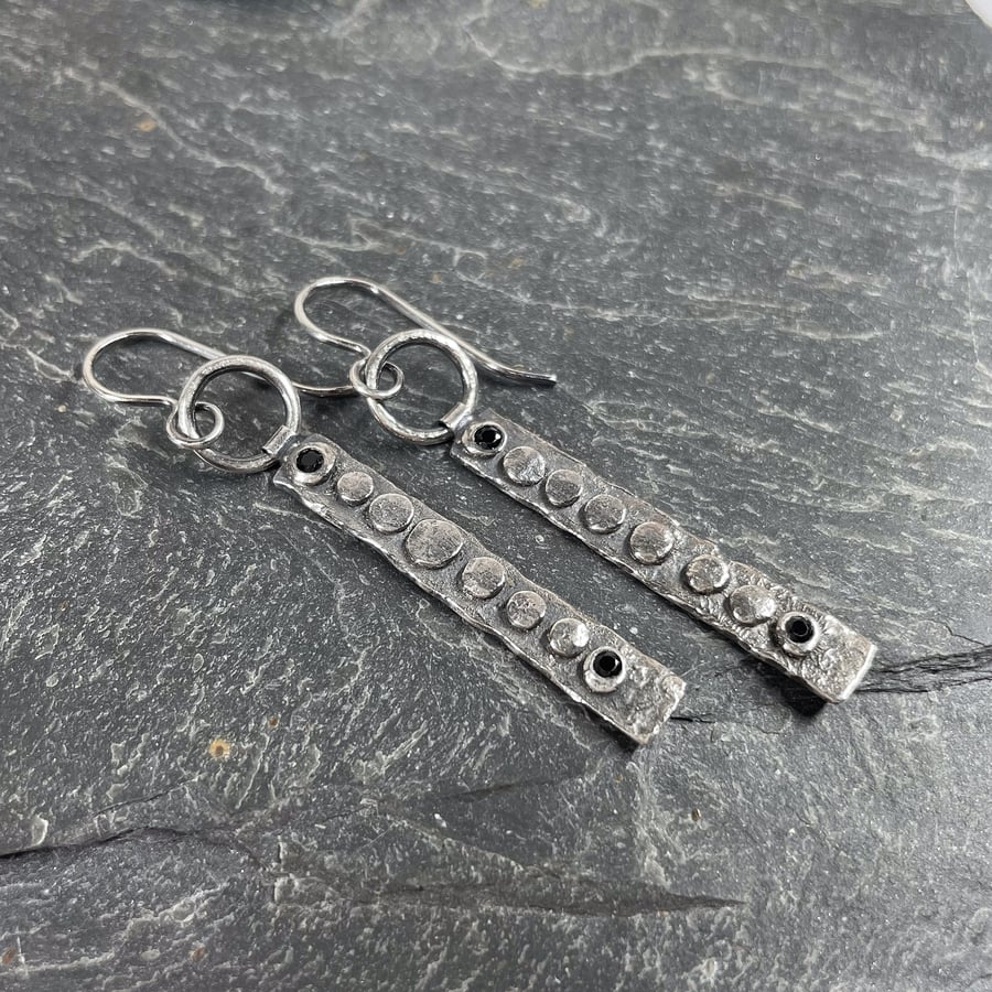 Oxidised silver and black spinel long industrial earrings