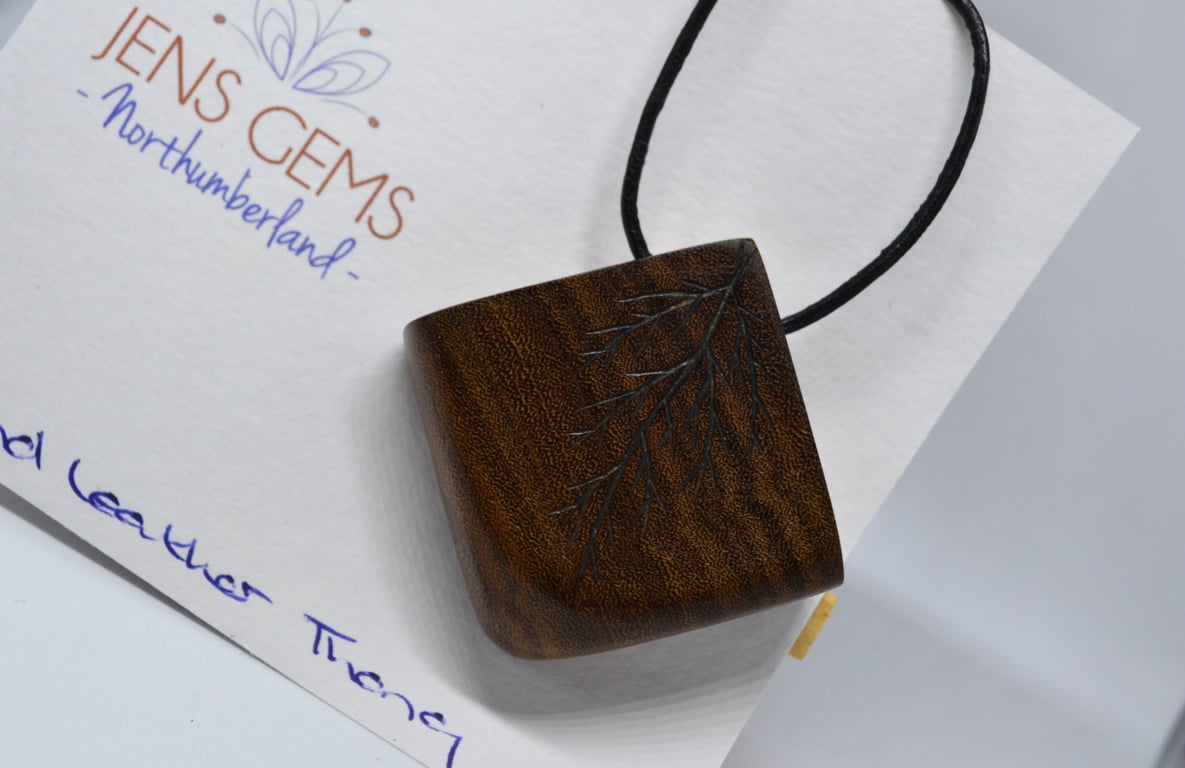 Recycled Teak Pendant on Black Leather Cord