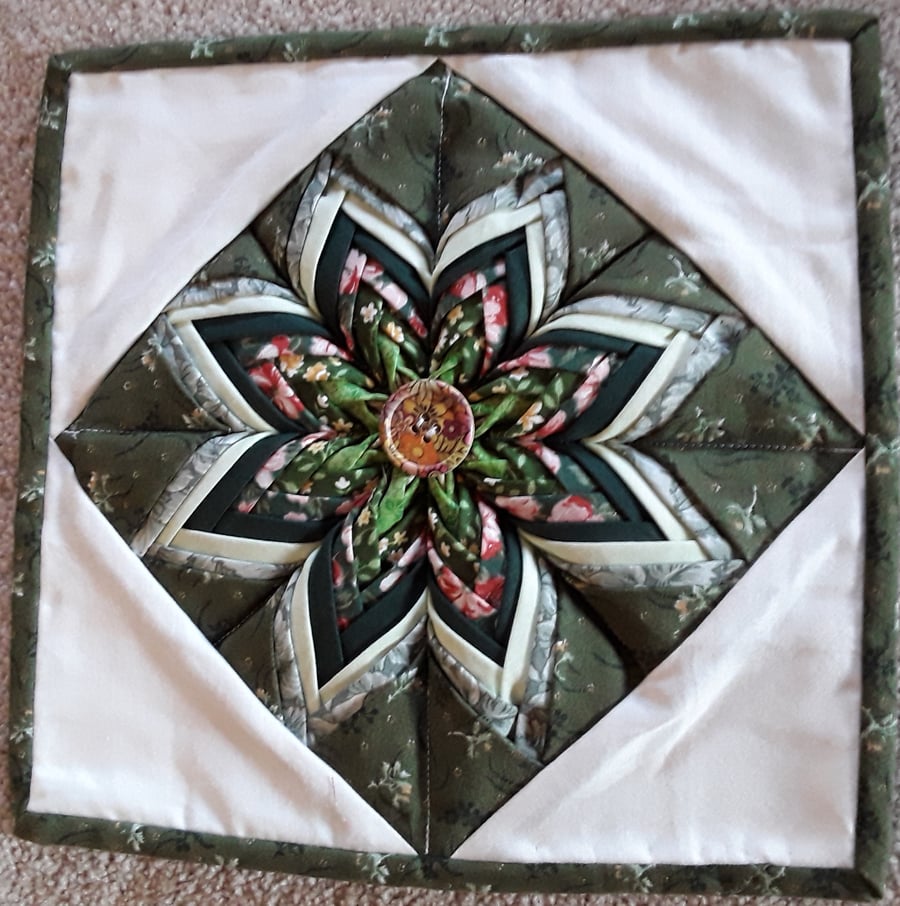 Homemade folded star, flower green pot holder, table centre