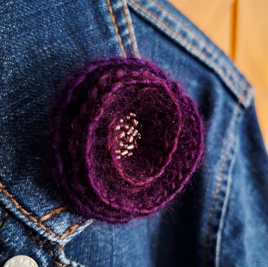 Crocheted brooch with beads - purple shades