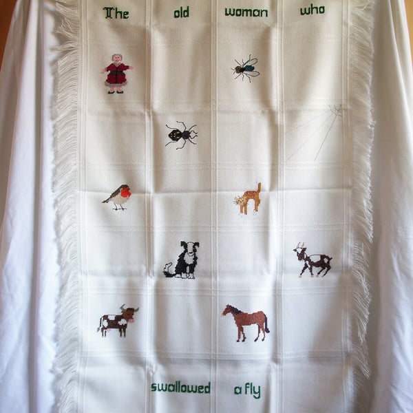 Shawl, wall hanging, 'The Old Woman who Swallowed a Fly', hand embroidered