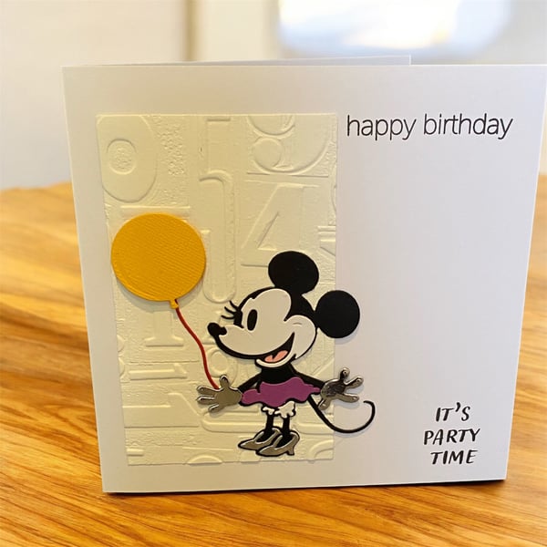 Please write a social media post for this handmade Minnie Mouse card with a numb