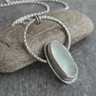 White seaglass pendant, Oval glass on oxidised silver hoop necklace