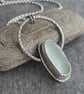 White seaglass pendant, Oval glass on oxidised silver hoop necklace