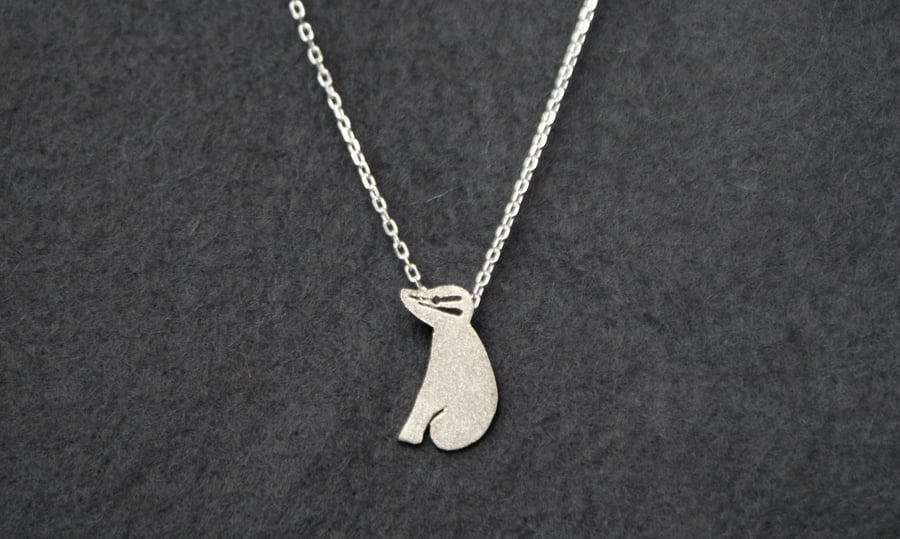 Edge of the woods tiny badger necklace