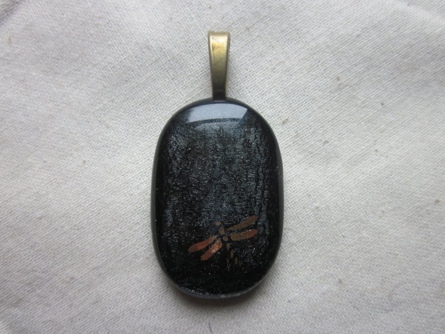 Handmade dichroic glass cabochon pendant - oval steel with gold dragonfly
