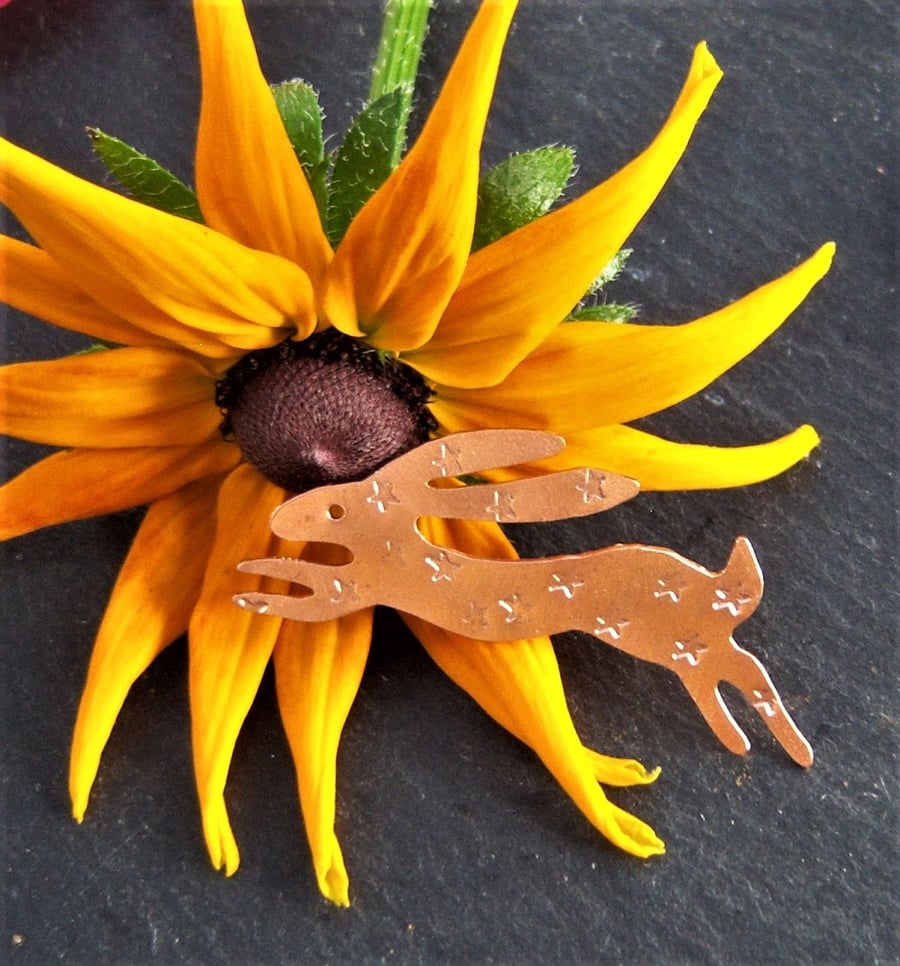 Hare brooch in copper