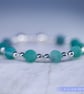 Beaded bracelet with crackle glass and sterling silver green blue stretchy - Image 3