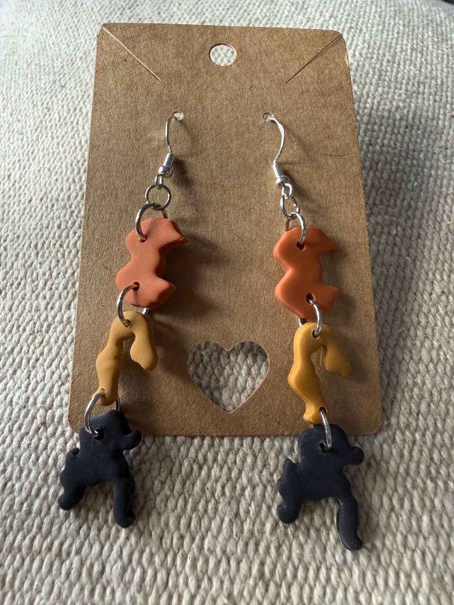 Polymer clay spooky sister dangly earrings