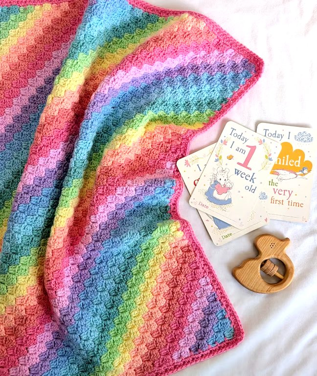 Handmade rainbow crochet baby blanket