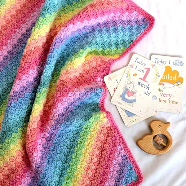Handmade rainbow crochet baby blanket