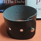 40mm width black leather wristband.