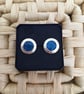 Scroll Edged Brilliant Blue Stud Earrings - Image 1