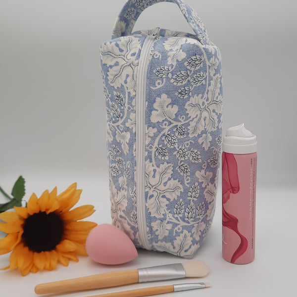 Toiletries, cosmetics, make up travel bag, blue and white foliage quilted. 