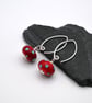 red and blue polka dot lampwork glass earrings