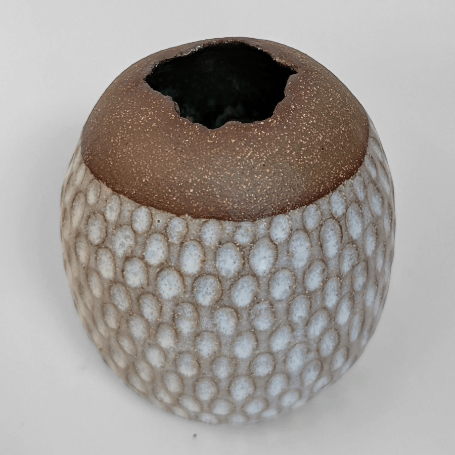 Coiled stoneware pot