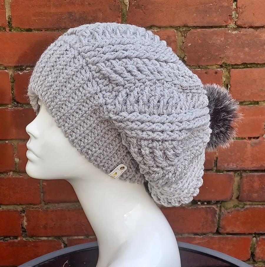 Crochet slouchy beanie, silver winter hat with black pompom