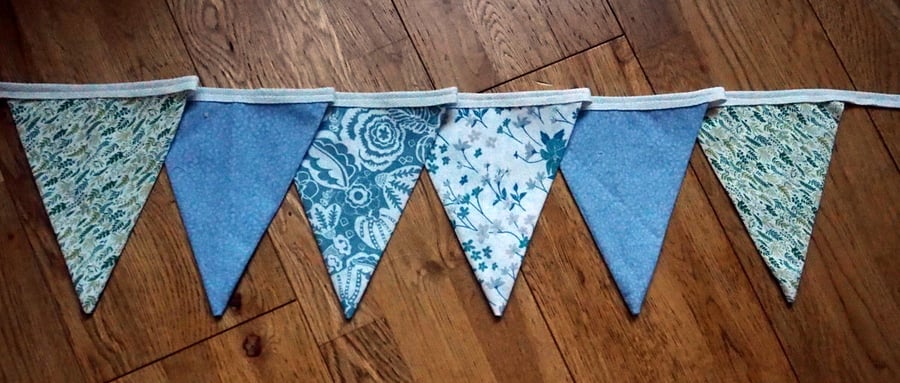 Pale Green Blue Bunting   