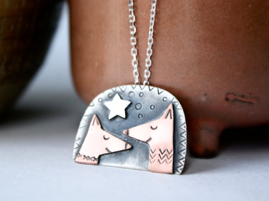 'Dreaming of chickens' silver fox pendant