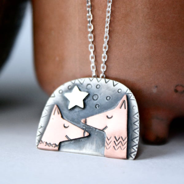 'Dreaming of chickens' silver fox pendant