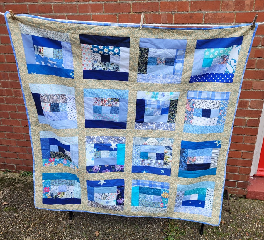 Homemade Blue Log cabin quilt. Approx measures 50" x 49"