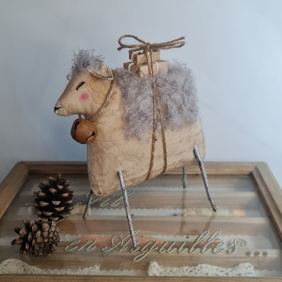Handmade folk sheep with parcels