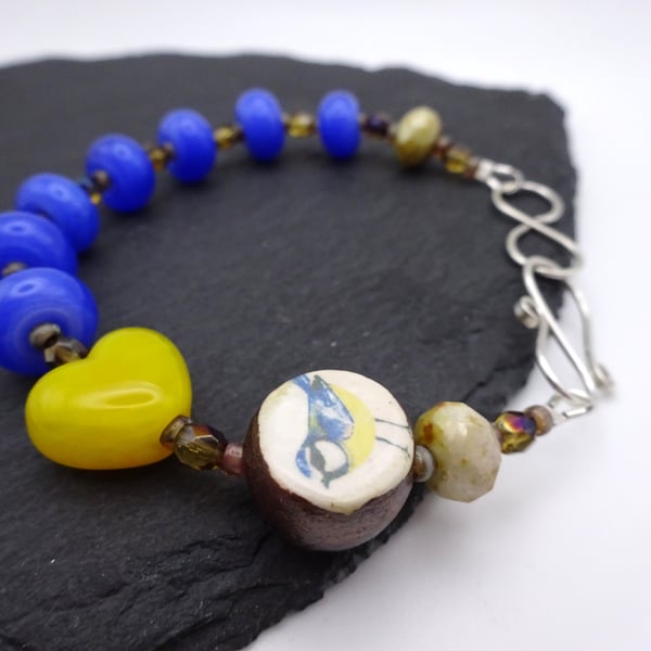 lampwork glass bracelet, blue tit ceramic jewellery