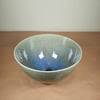 Hand thrown green blue star burst ceramic bowl