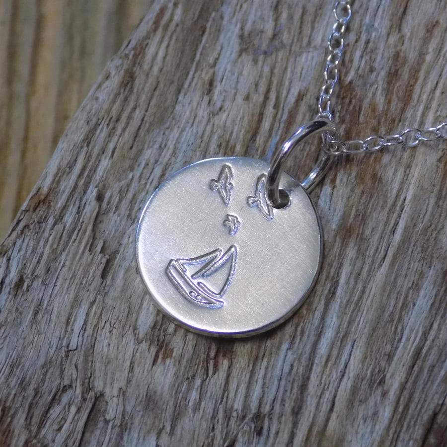 Sterling silver boat and birds disc pendant 